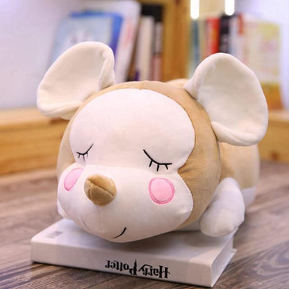 Mouse doll lying on the mouse pillow