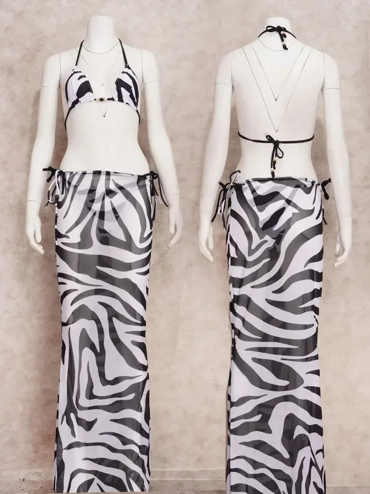 Zebra bikini set with skirt for a fierce beach look.